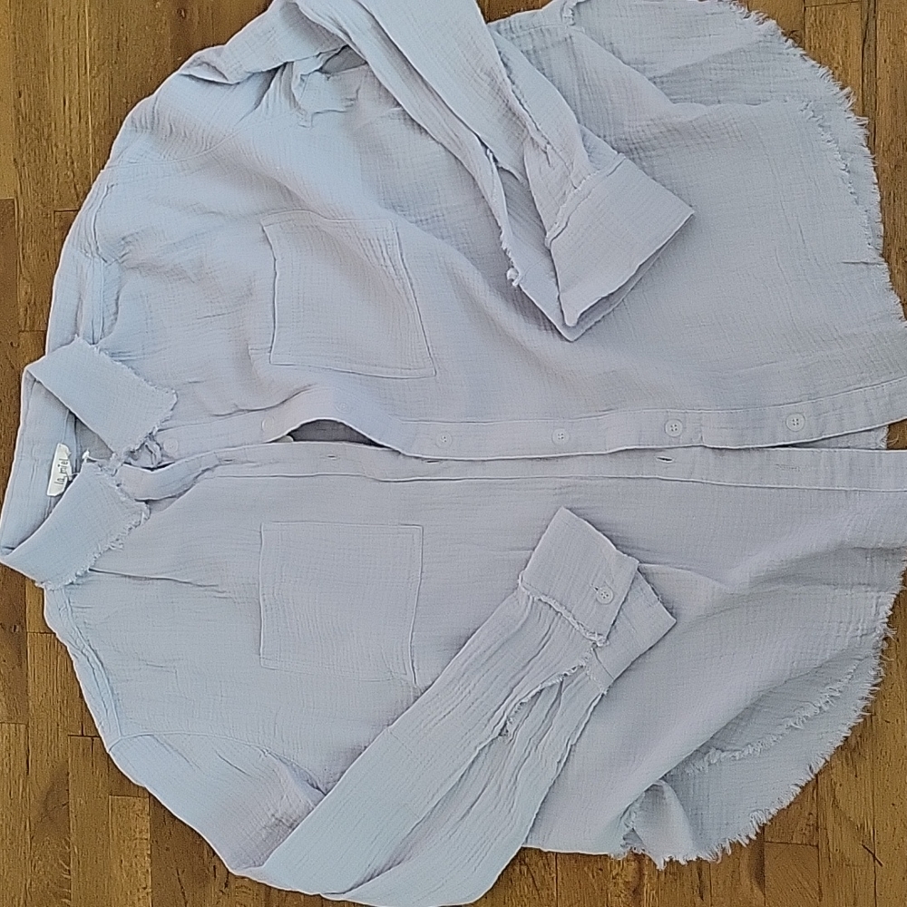 Small light blue button down top